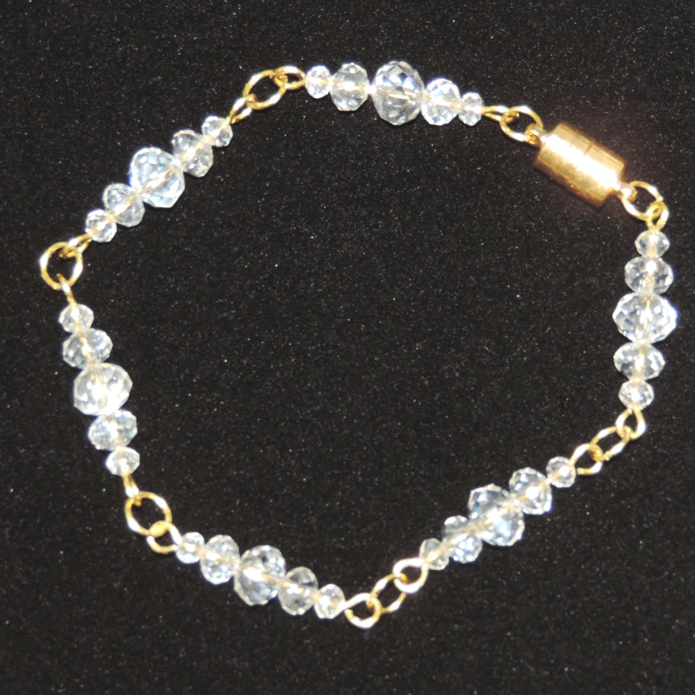 Gold and crystal bracelet